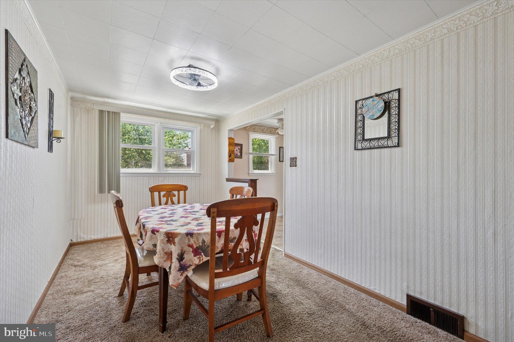 1935 Carter Road Folcroft, PA 19032 - Photo 7 of 15 a view of a dining room with furniture and a window