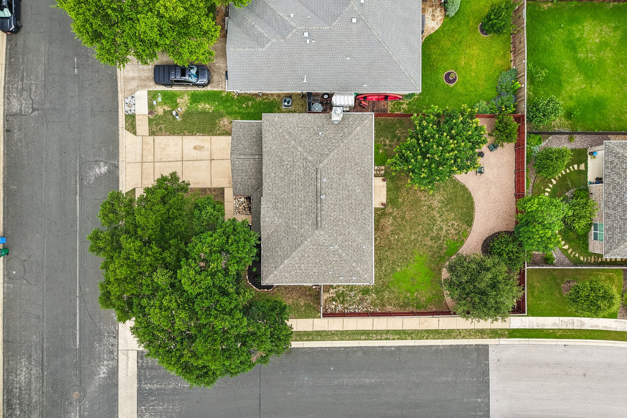 4100 Mocha Trail Austin, TX 78728 - Photo 30 of 33 An aerial perspective reveals a neatly maintained property with mature trees and ample green space.