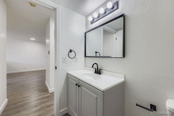 8678 Decatur Street, Unit 275 Westminster, CO 80031 - Photo 20 of 26 a bathroom with a sink and a mirror