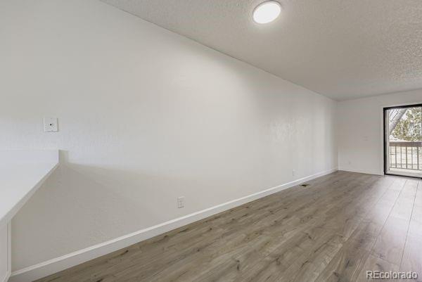 8678 Decatur Street, Unit 275 Westminster, CO 80031 - Photo 8 of 26 a view of an empty room and window