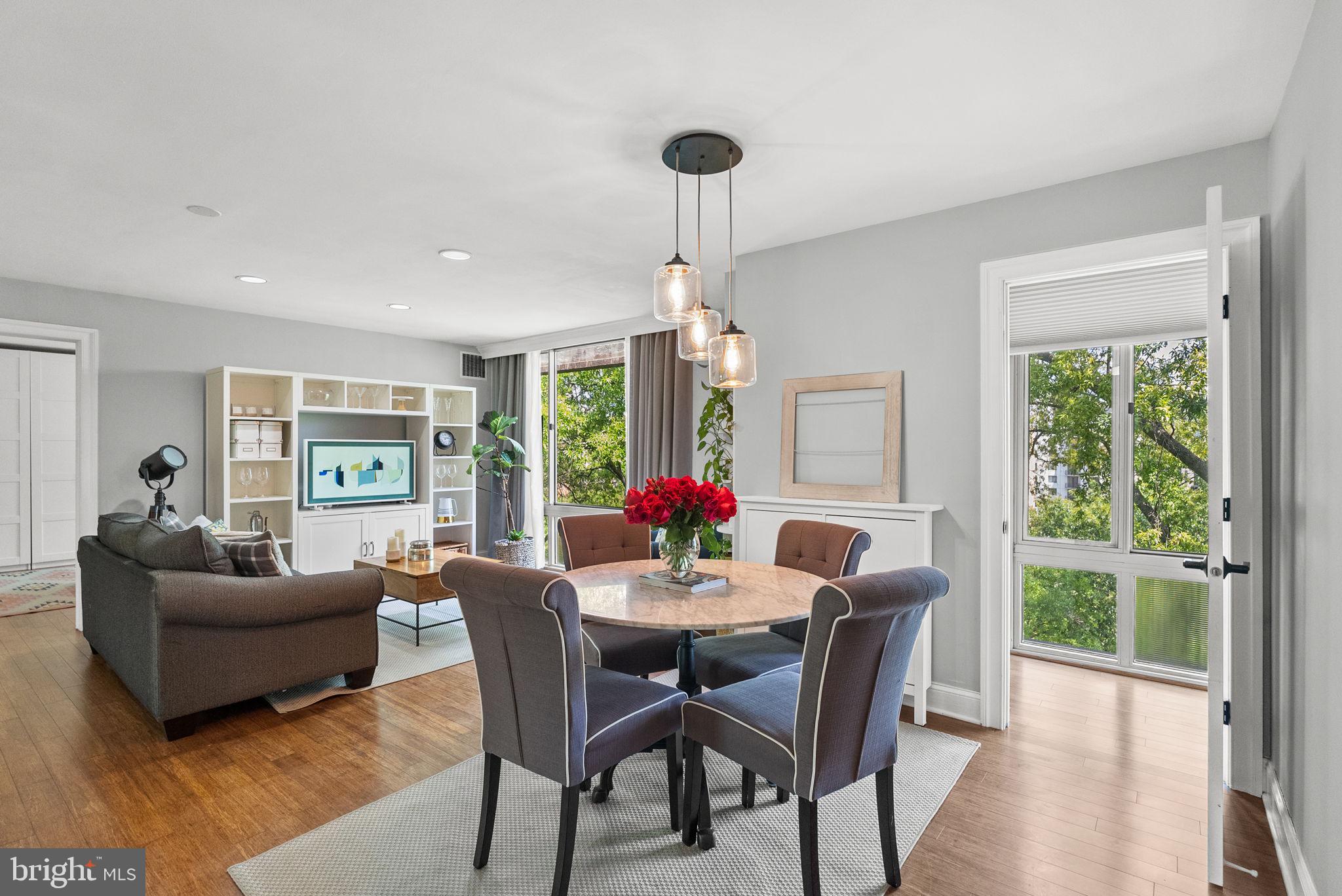a view of a dining room with furniture window and outside view