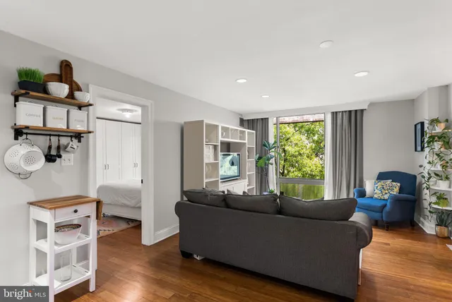 a living room with furniture and window