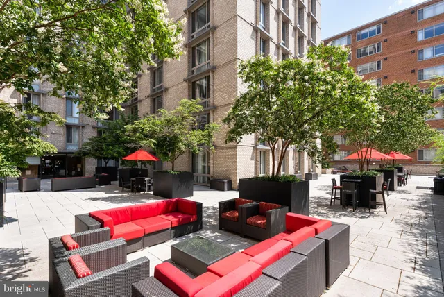a view of a workspace with furniture