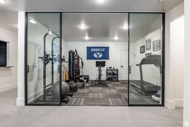 3247 South Mapleton Estates Drive Mapleton, UT 84664 - Photo 16 of 70 Workout area with carpet floors and glass walls