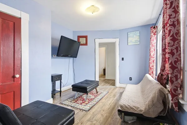 a view of workspace with furniture and cabinet