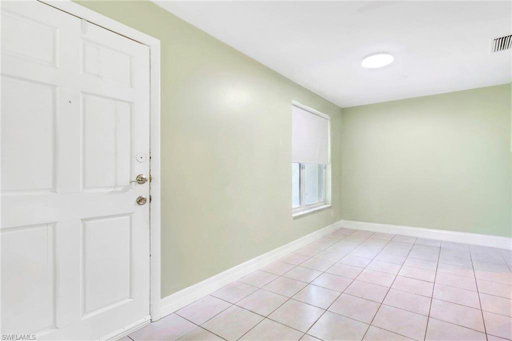 5306 Martin Street Naples, FL 34113 - Photo 17 of 48 a view of an empty room