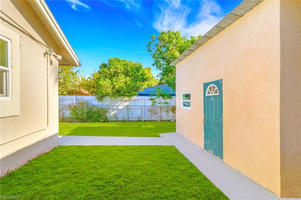 5306 Martin Street Naples, FL 34113 - Photo 4 of 48 a view of a back yard from a balcony