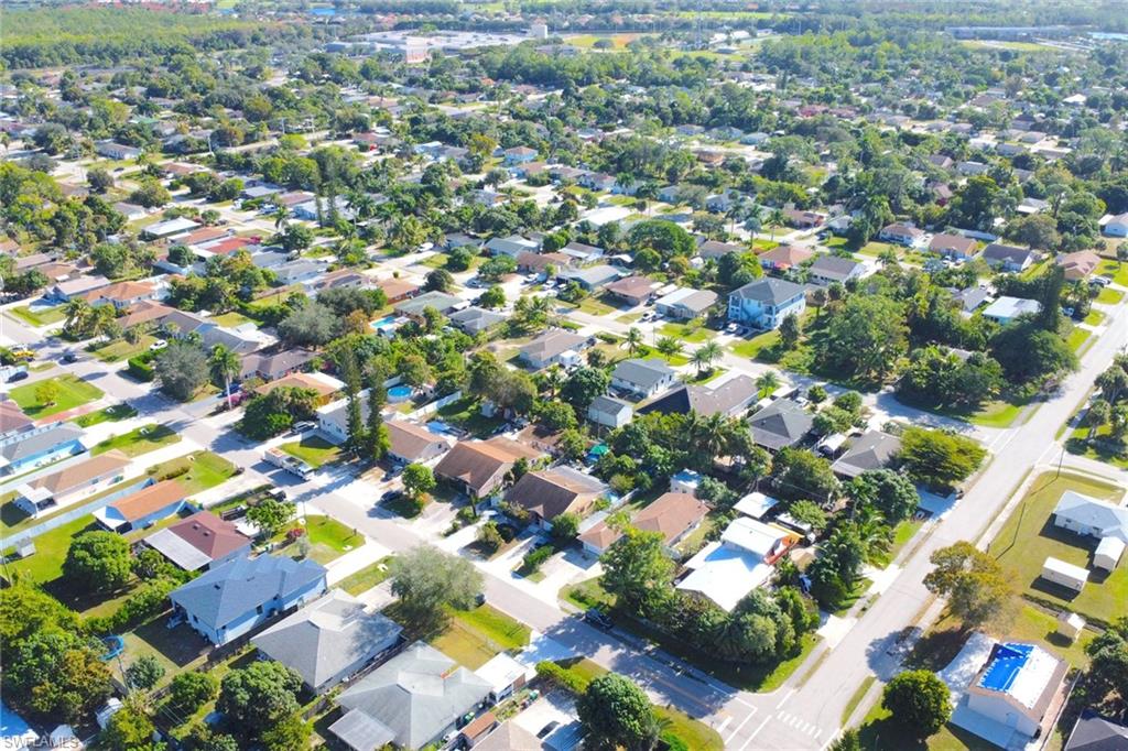 5306 Martin Street Naples, FL 34113 - Photo 47 of 48 an aerial view of residential houses with outdoor space