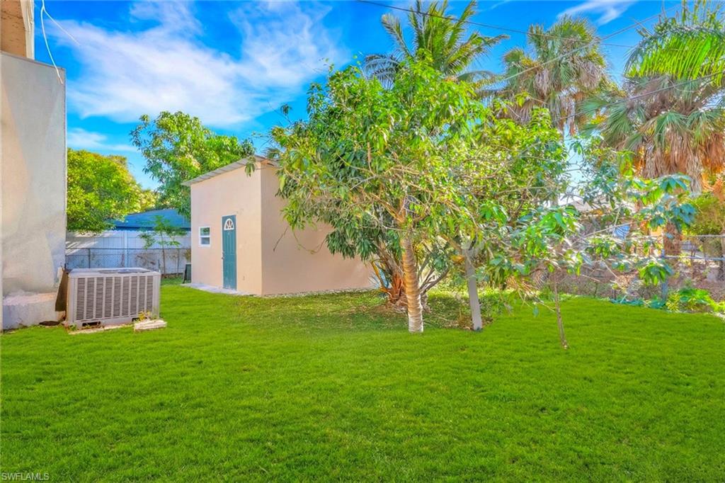 5306 Martin Street Naples, FL 34113 - Photo 5 of 48 a view of a garden with a house
