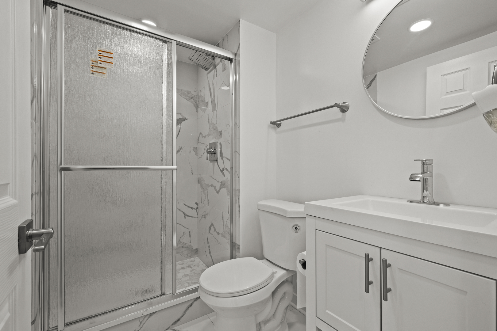 1813 West Pheasant Trail Mount Prospect, IL 60056 - Photo 15 of 31 a bathroom with a sink toilet and shower