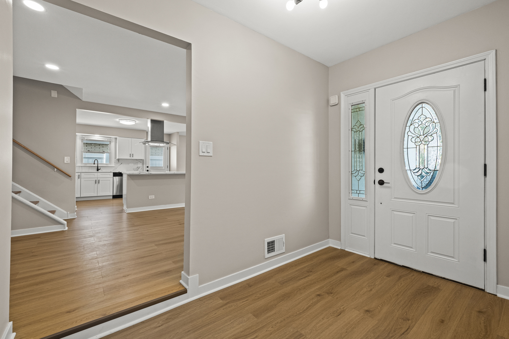 1813 West Pheasant Trail Mount Prospect, IL 60056 - Photo 16 of 31 a view of a room with wooden floor and a window