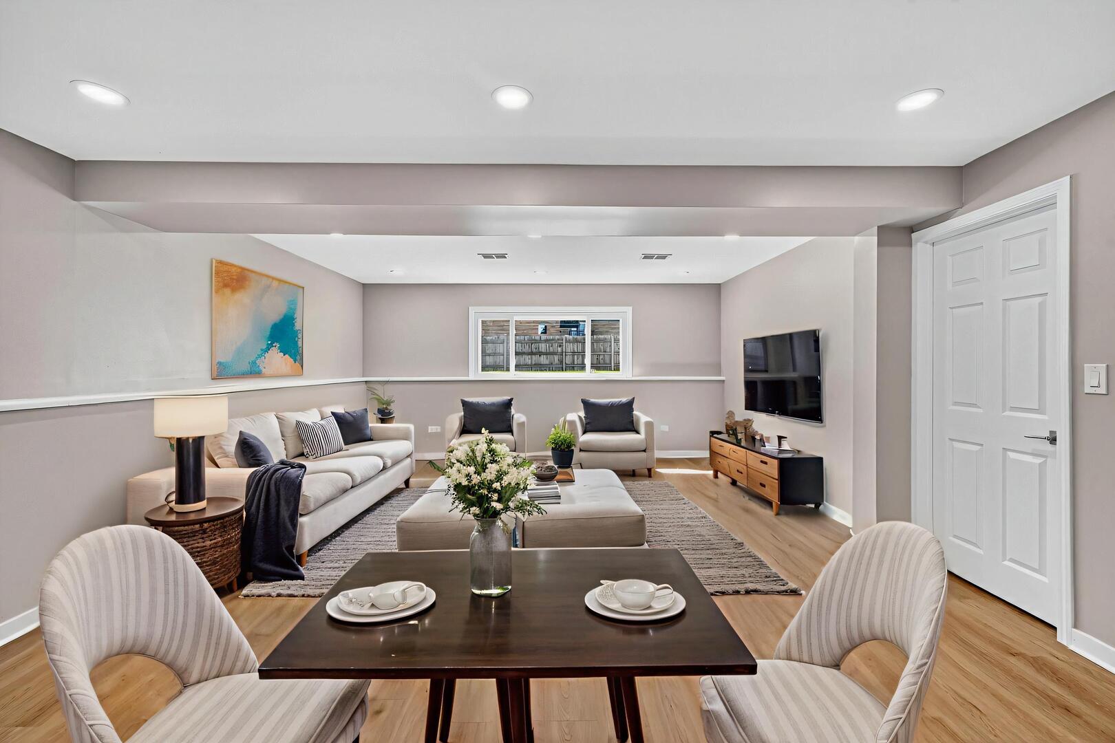 1813 West Pheasant Trail Mount Prospect, IL 60056 - Photo 4 of 31 a view of a dining room with furniture and wooden floor
