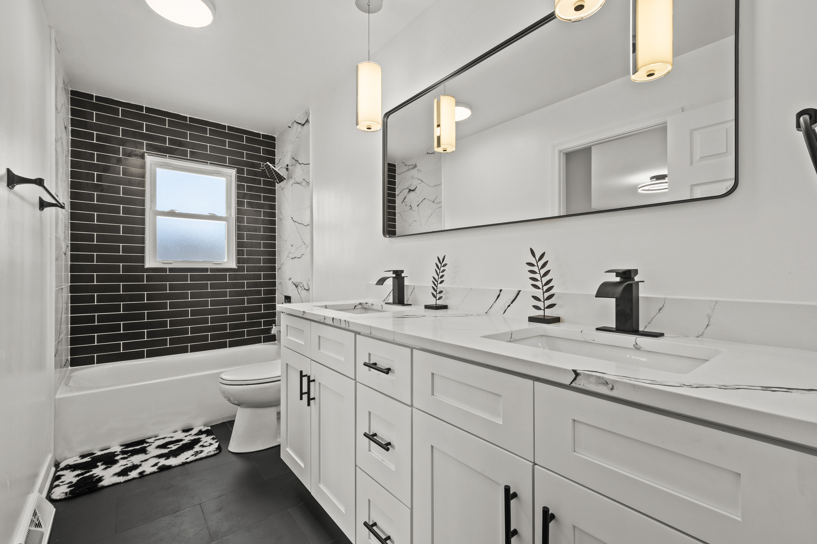 1813 West Pheasant Trail Mount Prospect, IL 60056 - Photo 9 of 31 a bathroom with a sink a toilet and shower