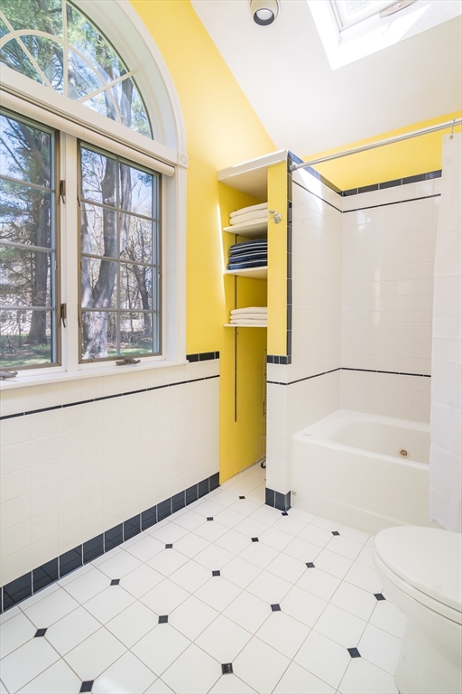 116 Stock Farm Road Sudbury, MA 01776 - Photo 17 of 31 a bathroom with a bathtub and a shower