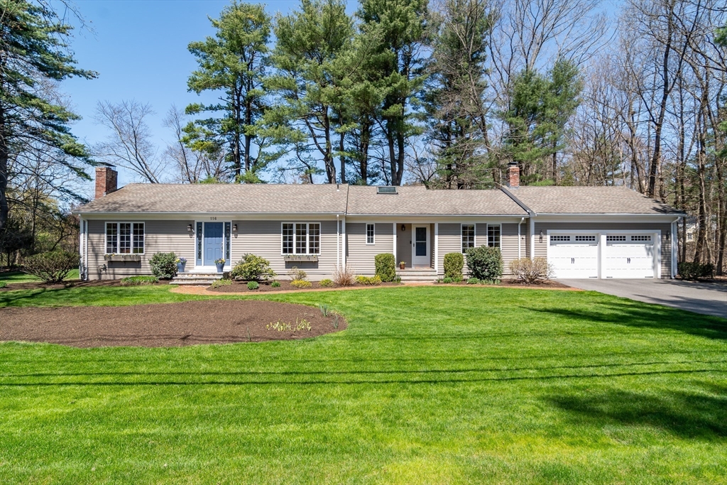 116 Stock Farm Road Sudbury, MA 01776 - Photo 31 of 31 a front view of a house with a garden