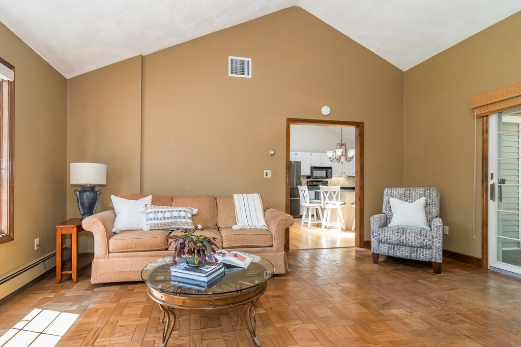 116 Stock Farm Road Sudbury, MA 01776 - Photo 6 of 31 a living room with furniture and a table