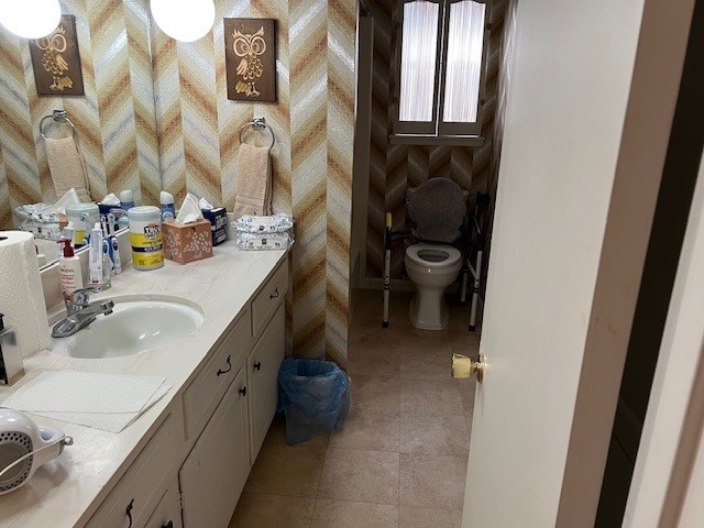 8639 Cedarbrake Drive Spring Valley Village, TX 77055 - Photo 15 of 26 This charming hall bath features a convenient tub/shower combo and a sleek single sink, perfect for functional living.