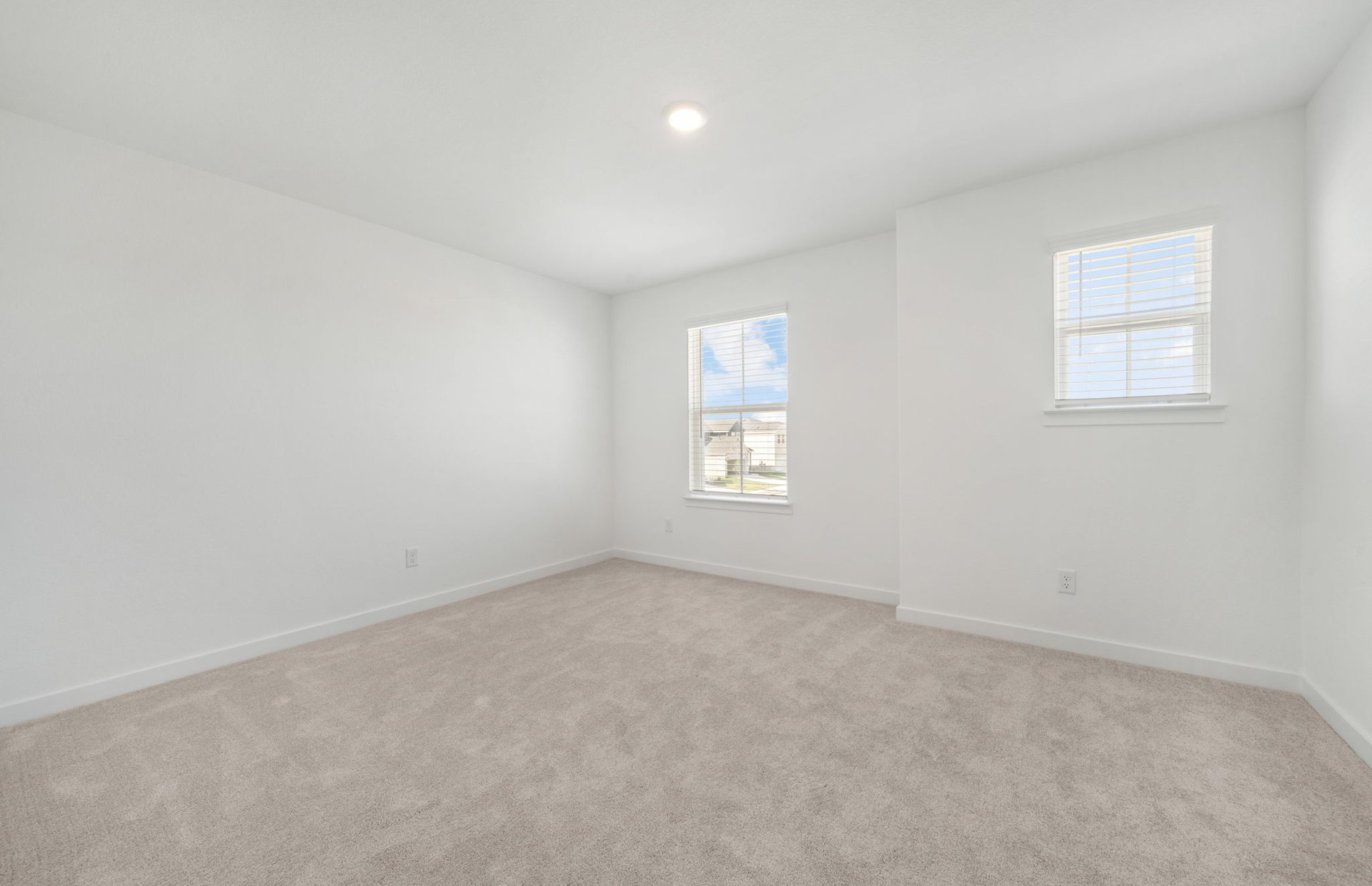 608 Rubber Tree Way Buda, TX 78610 - Photo 20 of 29 an empty room with a window