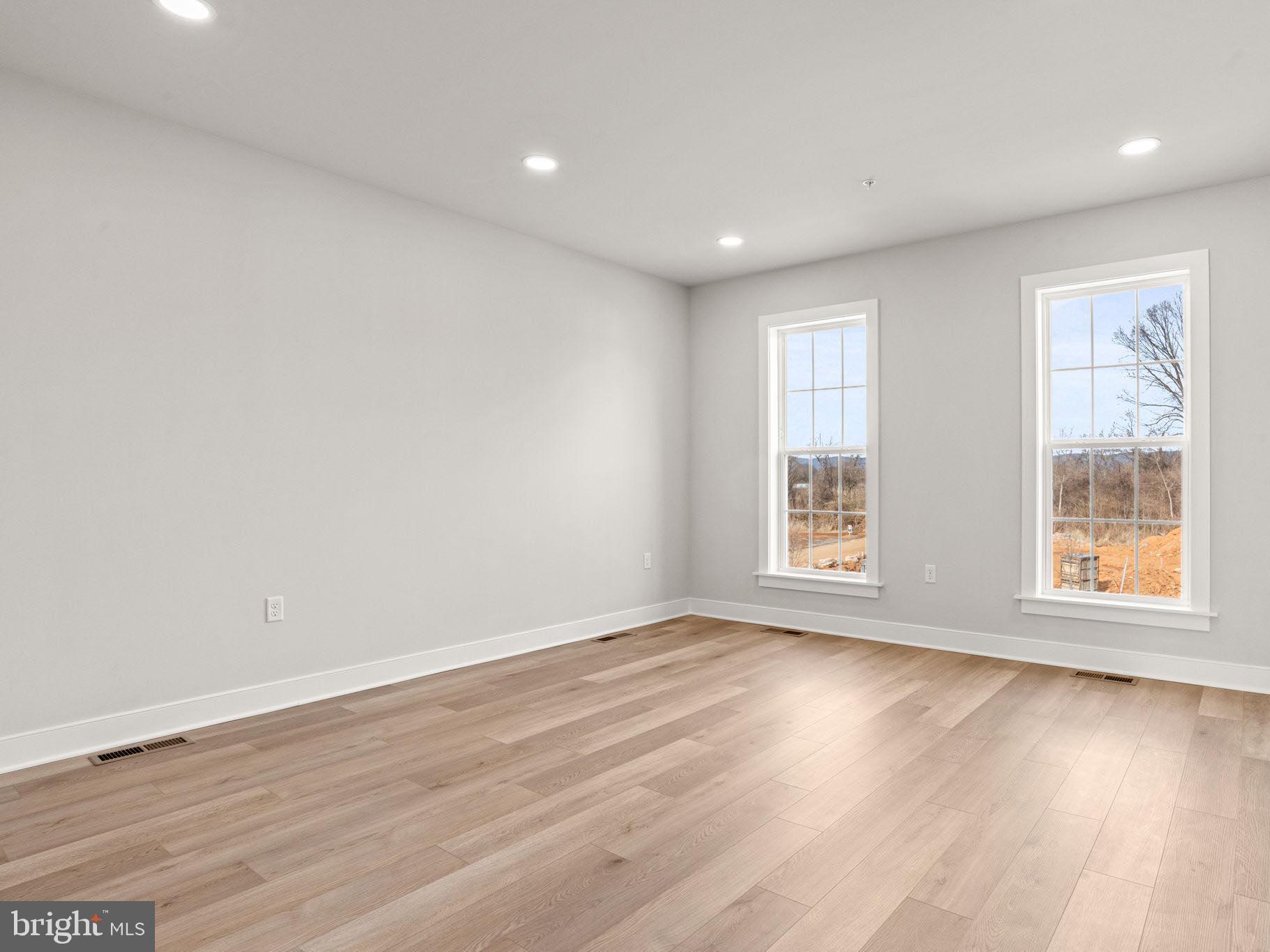 3 Sage Street Carlisle, PA 17015 - Photo 13 of 41 a view of an empty room with wooden floor and window