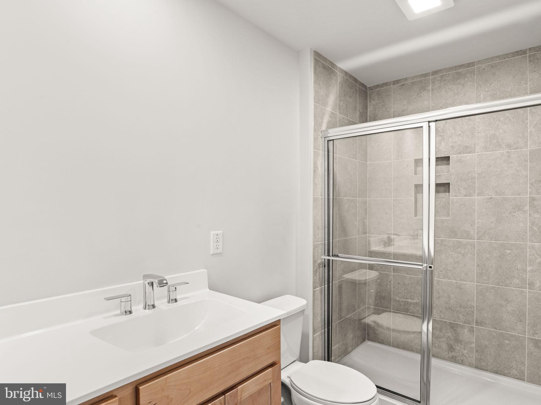 3 Sage Street Carlisle, PA 17015 - Photo 24 of 41 a bathroom with a sink toilet and shower