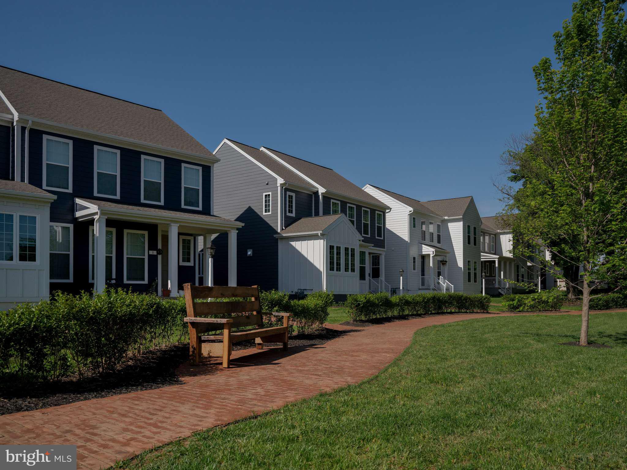 3 Sage Street Carlisle, PA 17015 - Photo 41 of 41 a front view of a house with a yard table and chairs