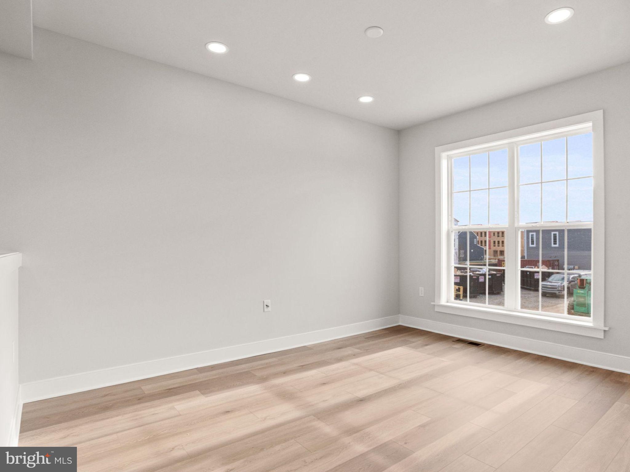 3 Sage Street Carlisle, PA 17015 - Photo 7 of 41 an empty room with wooden floor and windows