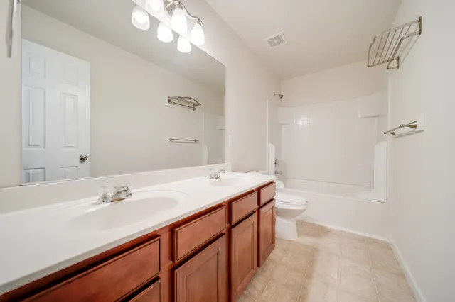 a view of a room with shelf with racks on the wall