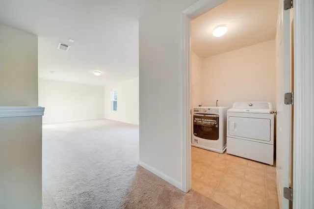 a kitchen with granite countertop a sink and a wooden cabinets
