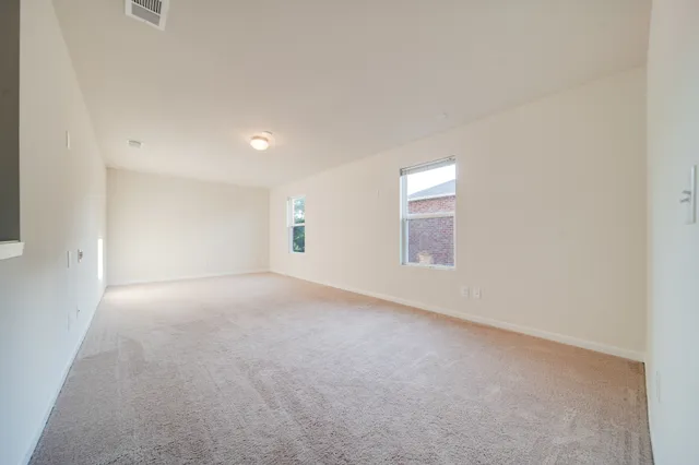 a bath tub sitting next to a shower