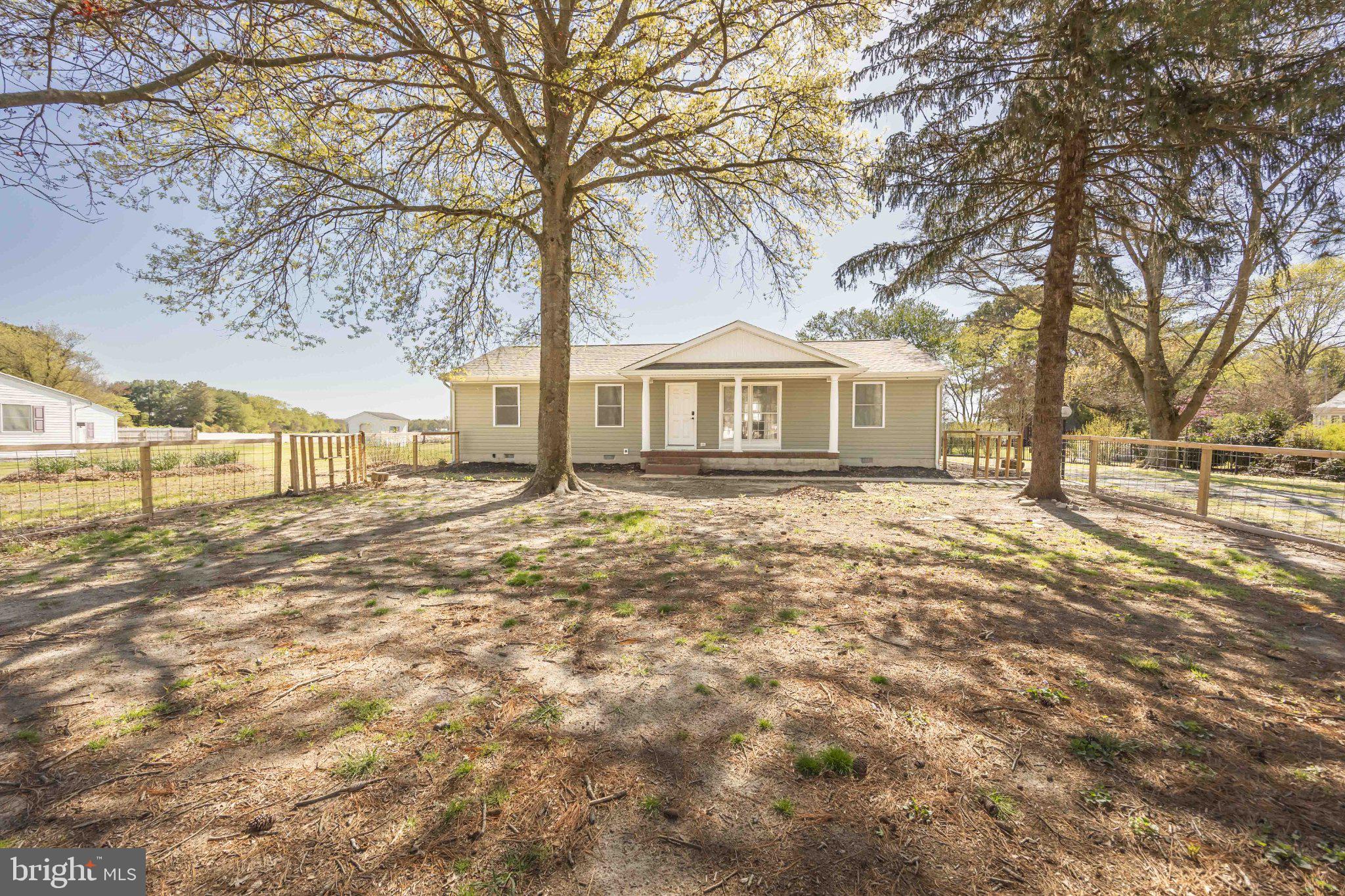 Charming home with spacious yard.