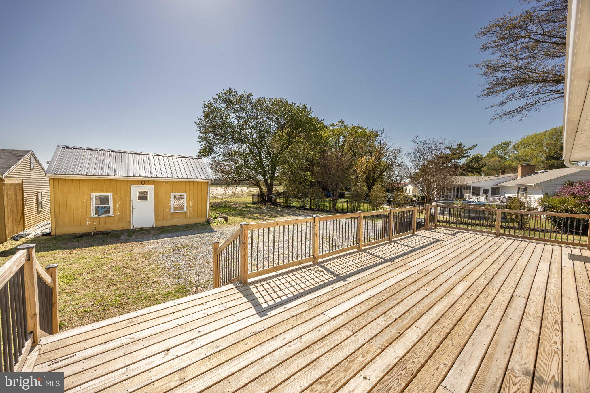 30797 Dagsboro Road Salisbury, MD 21804 - Photo 47 of 58 Sunny deck with serene backyard views.
