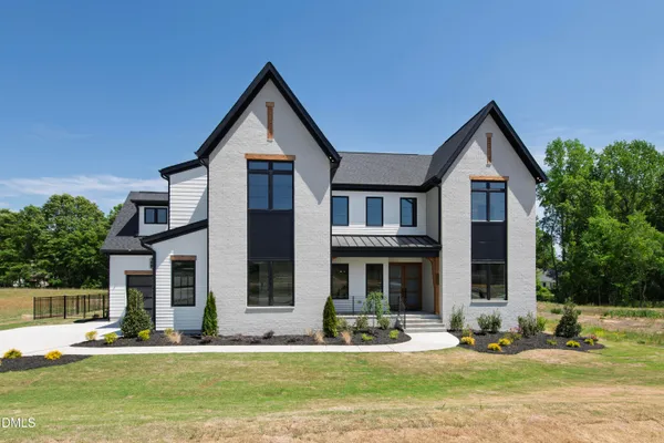 $1,450,000 | 5841 Carriage Drive, Raleigh, NC 27603