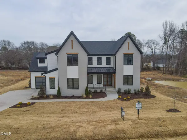 $1,450,000 | 5841 Carriage Drive, Raleigh, NC 27603