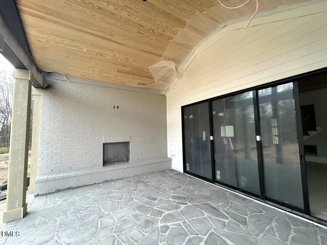 a view of living room with a fireplace