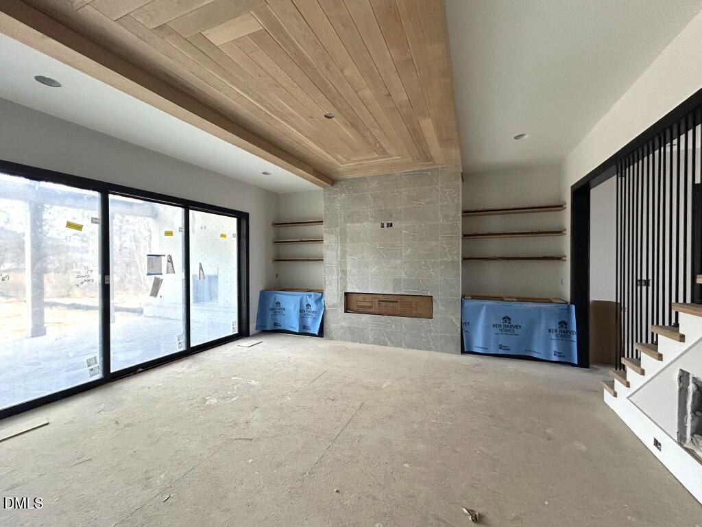 5841 Carriage Drive Raleigh, NC 27603 - Photo 7 of 33 a view of an empty room with a window