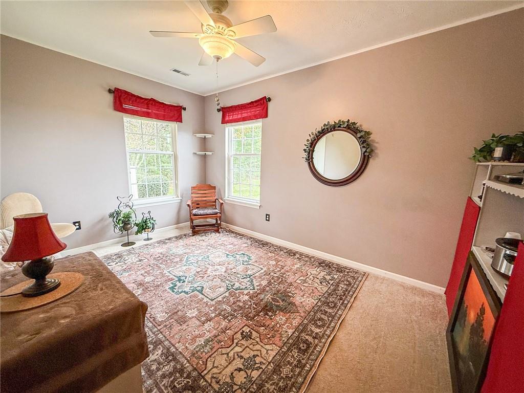 2113 Winchester Court Renfrew, PA 16053 - Photo 27 of 45 a bedroom with a bed and a chandelier