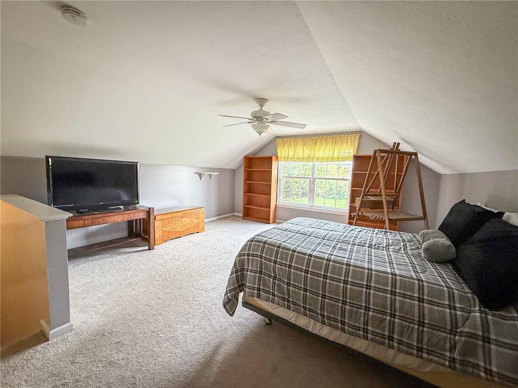 2113 Winchester Court Renfrew, PA 16053 - Photo 34 of 45 a bedroom with a bed and flat screen tv