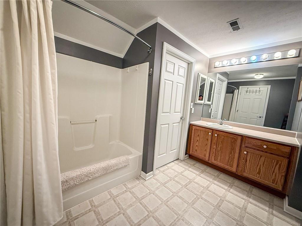 2113 Winchester Court Renfrew, PA 16053 - Photo 37 of 45 a bathroom with a tub shower and sink