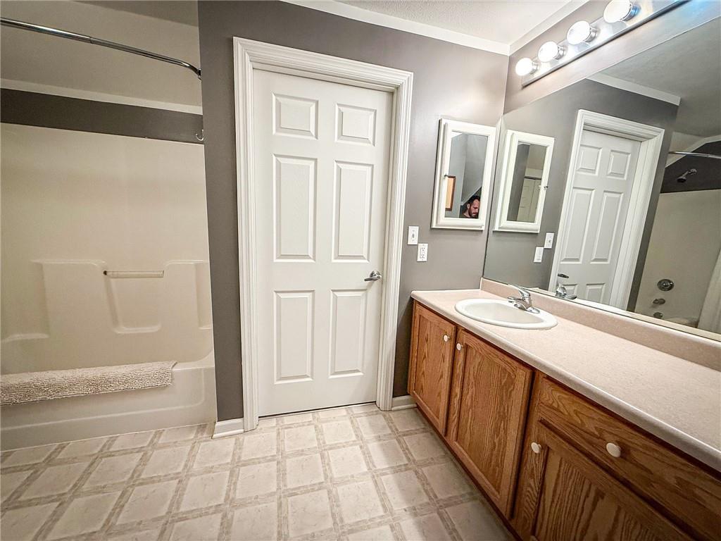 2113 Winchester Court Renfrew, PA 16053 - Photo 38 of 45 a bathroom with a sink a mirror and a bathtub