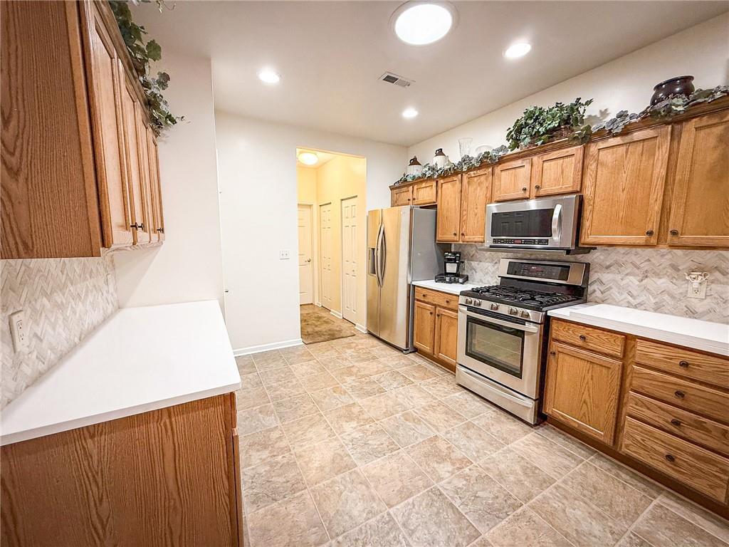 2113 Winchester Court Renfrew, PA 16053 - Photo 9 of 45 a kitchen with stainless steel appliances a stove a sink and a refrigerator