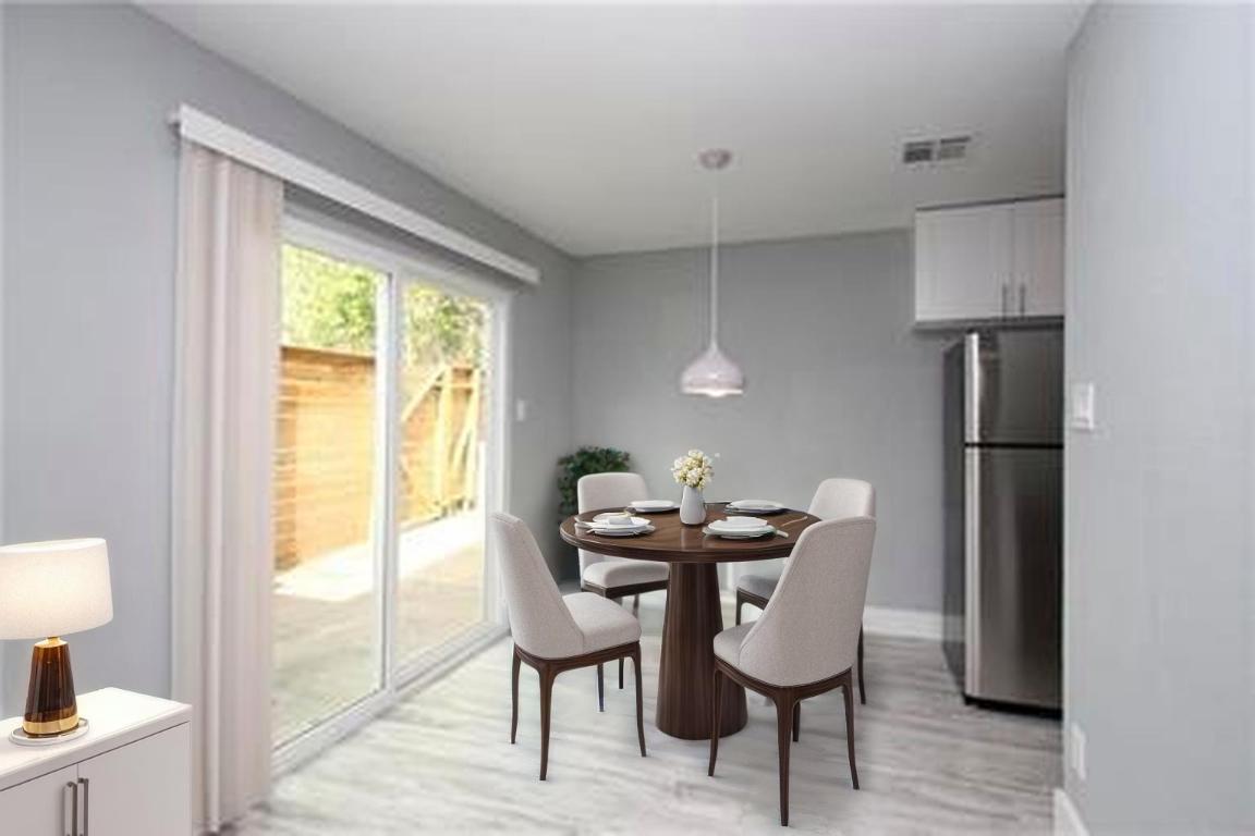 4721 Blueberry Trail, Unit A Austin, TX 78723 - Photo 2 of 23 a view of a dining room with furniture window and outside view