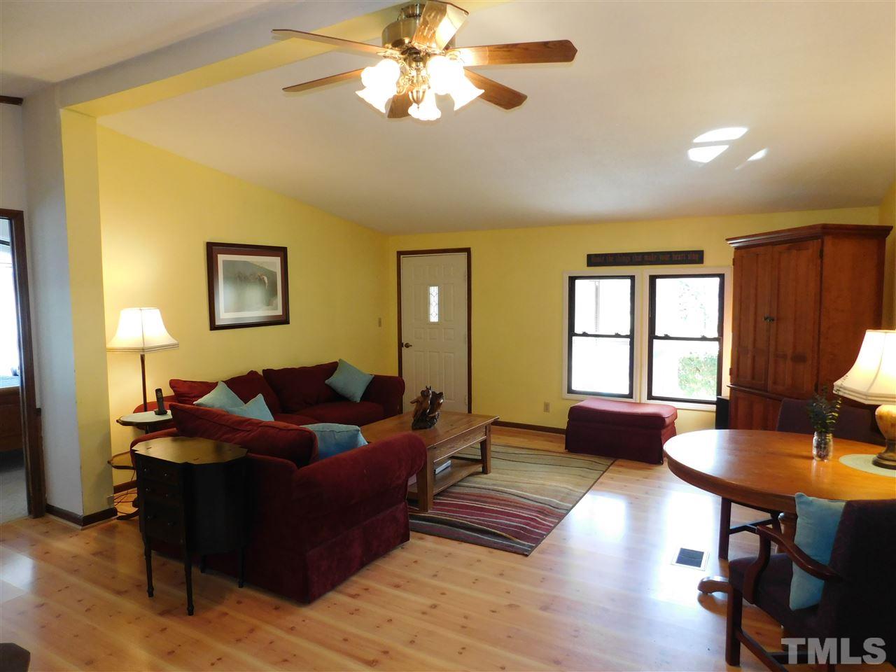 9402 Hampton Road Rougemont, NC 27572 - Photo 8 of 18 a living room with furniture and a window