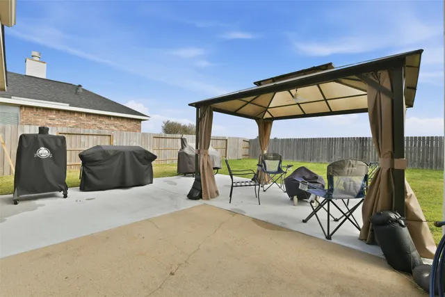 a view of swimming pool with seating space