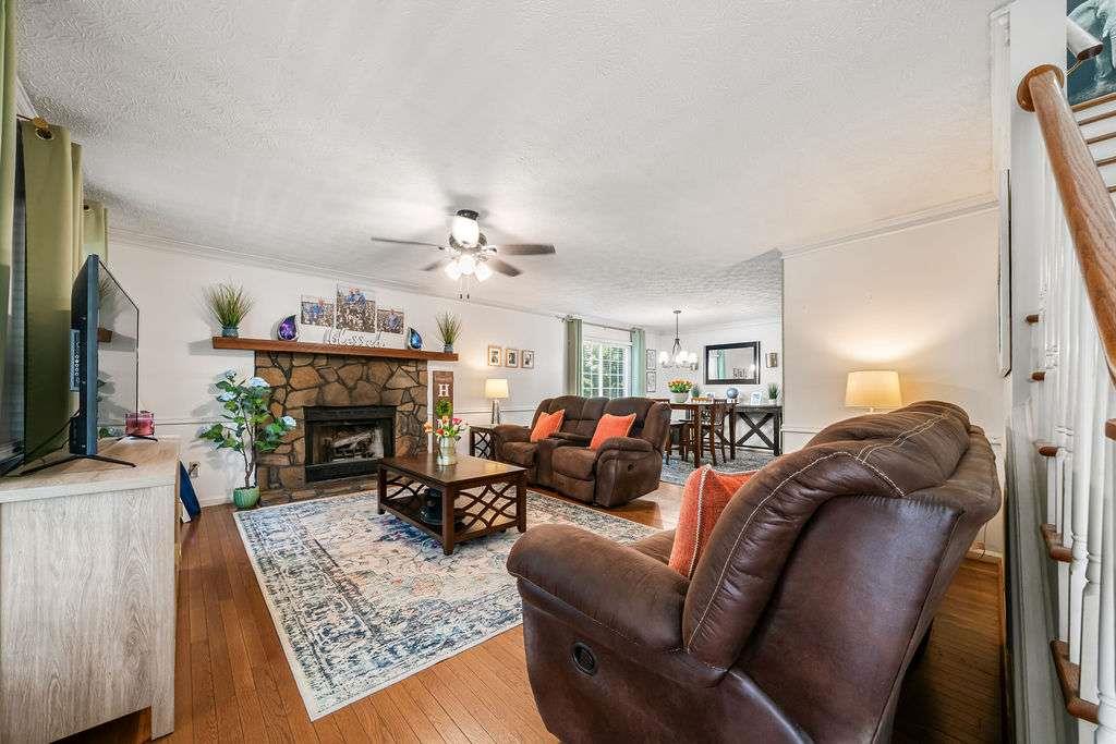 7 College View Drive Southwest Rome, GA 30161 - Photo 12 of 49 a living room with furniture and a fireplace