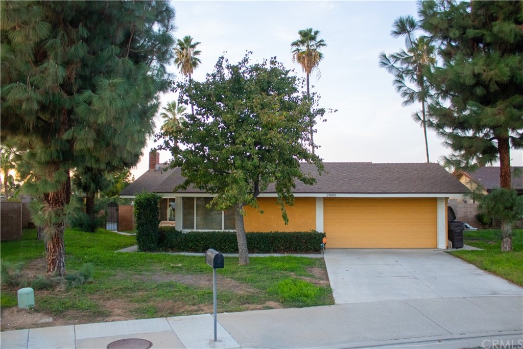 2880 Shalimar Place Riverside, CA 92504 - Photo 1 of 1 a front view of a house with garage