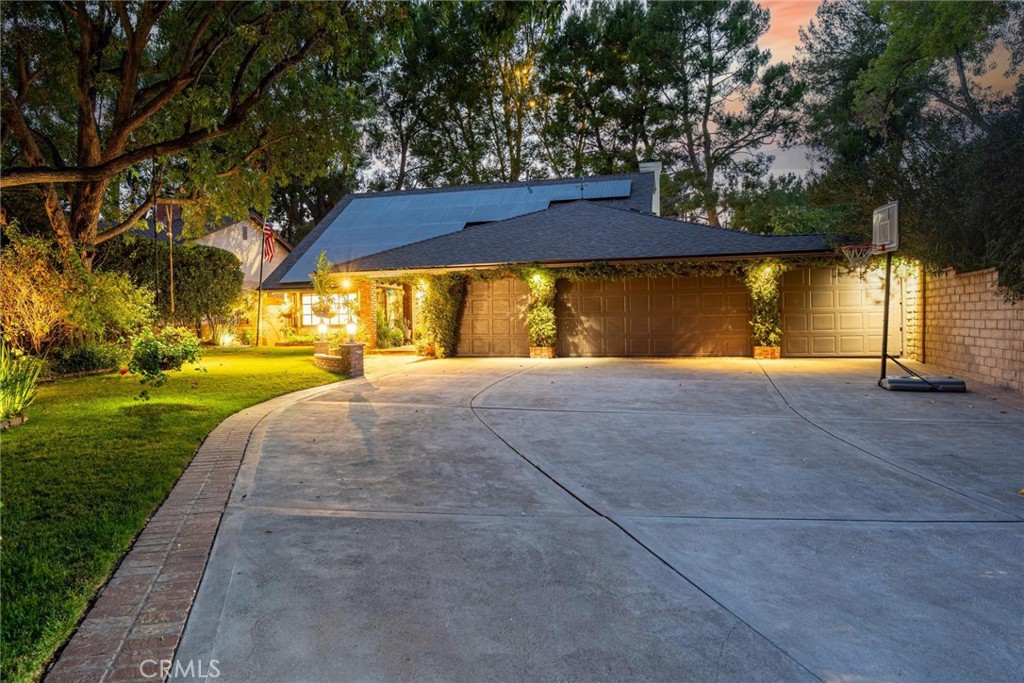 25261 Avenida Rondel Valencia, CA 91355 - Photo 2 of 68 a view of a house with a yard