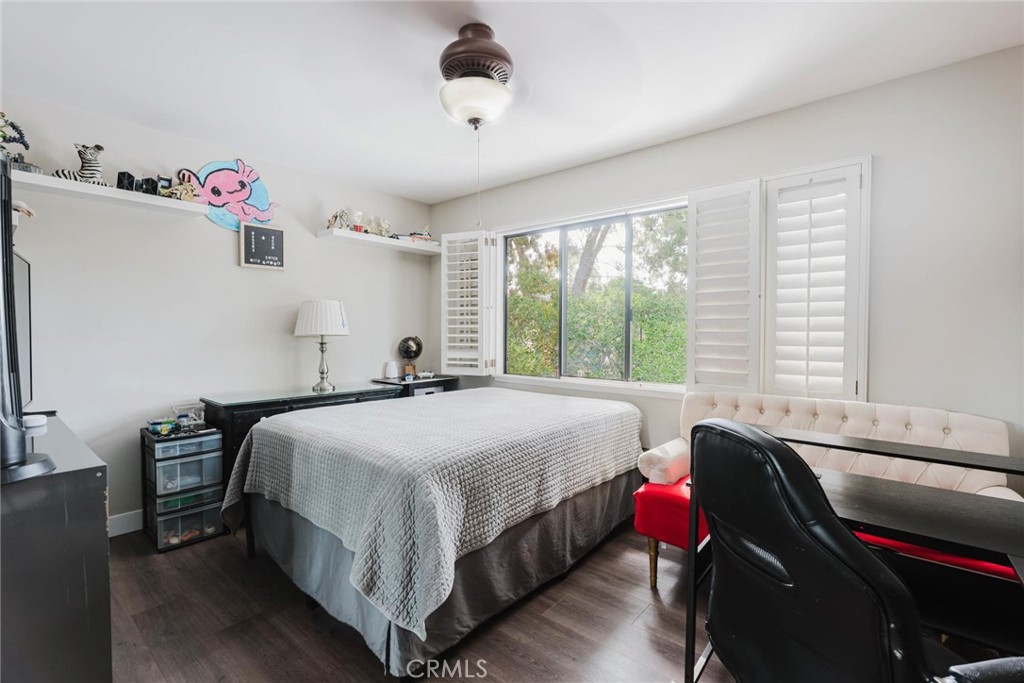 25261 Avenida Rondel Valencia, CA 91355 - Photo 27 of 68 a bedroom with a bed and a table