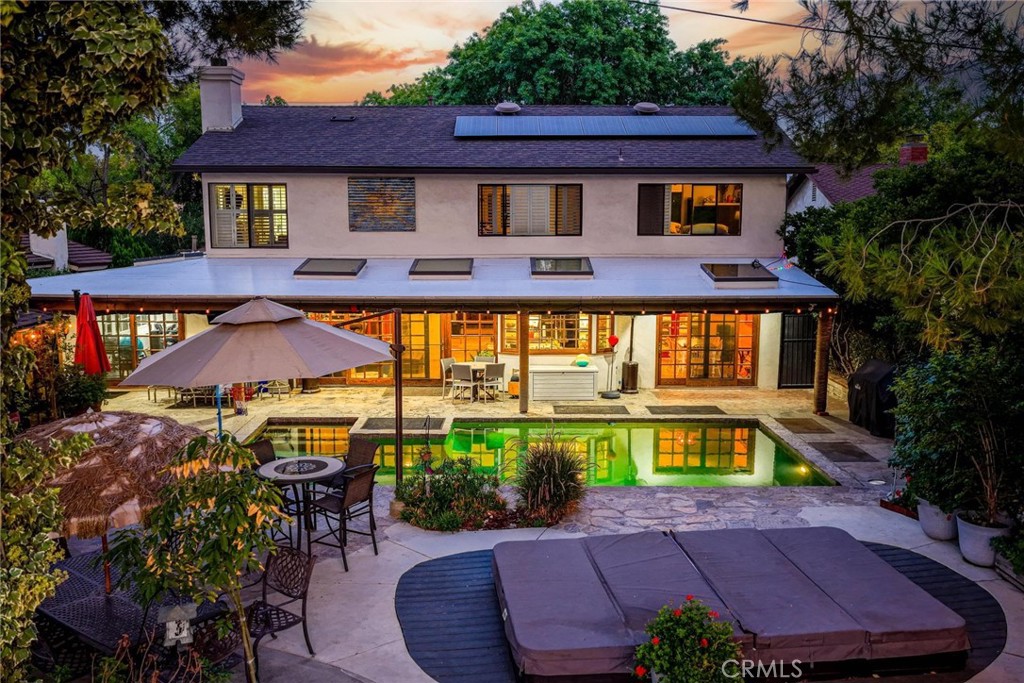 25261 Avenida Rondel Valencia, CA 91355 - Photo 3 of 68 a front view of a house with a yard and outdoor seating
