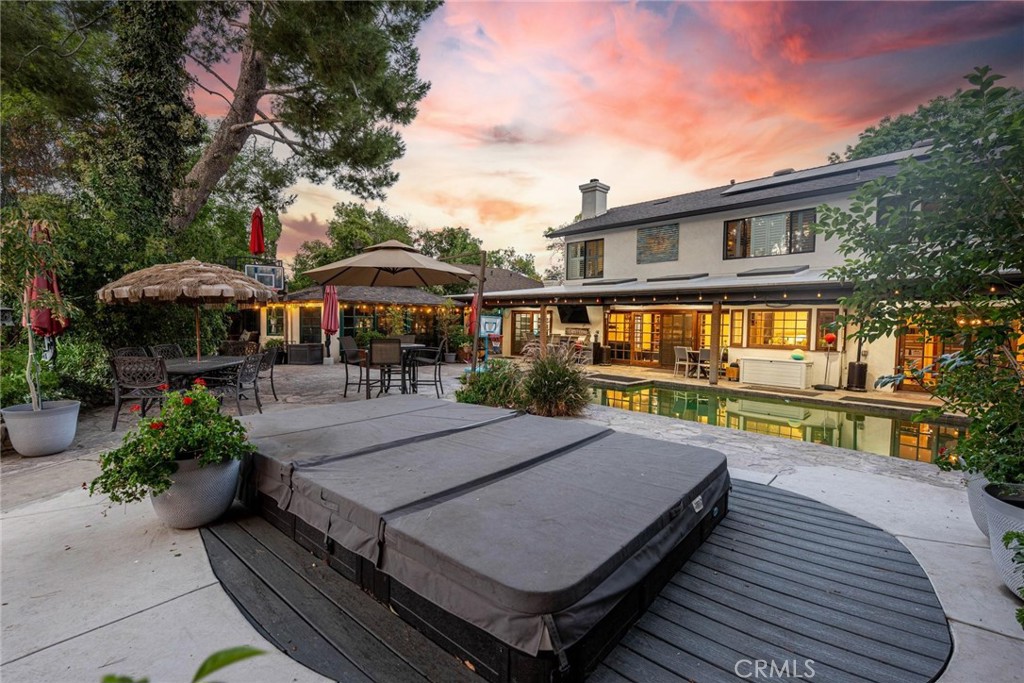 25261 Avenida Rondel Valencia, CA 91355 - Photo 44 of 68 a swimming pool with outdoor seating and yard