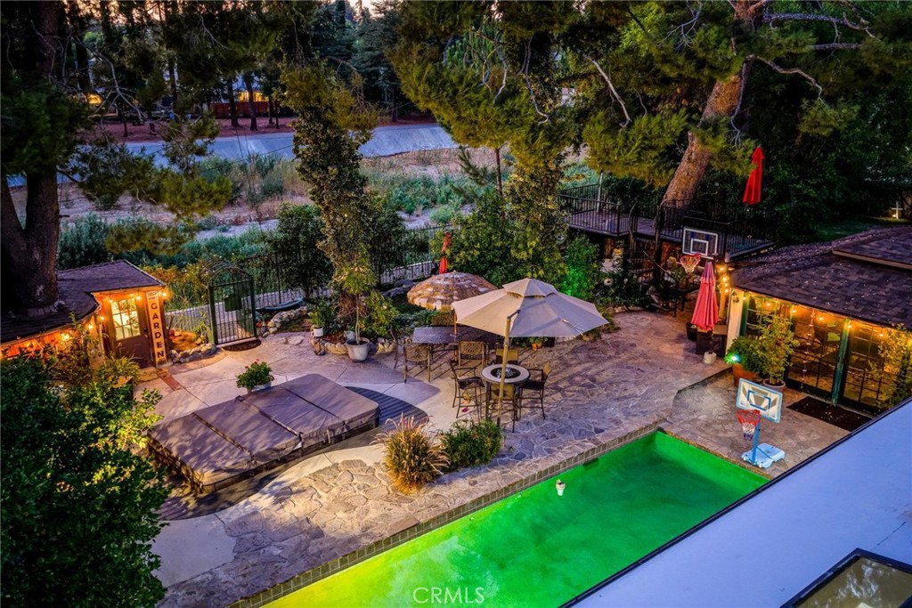 25261 Avenida Rondel Valencia, CA 91355 - Photo 5 of 68 an outdoor space with seating area and trees